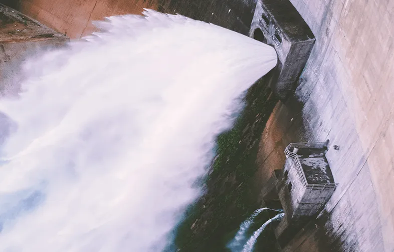 Water flow monitoring at dam spillway with strong water discharge